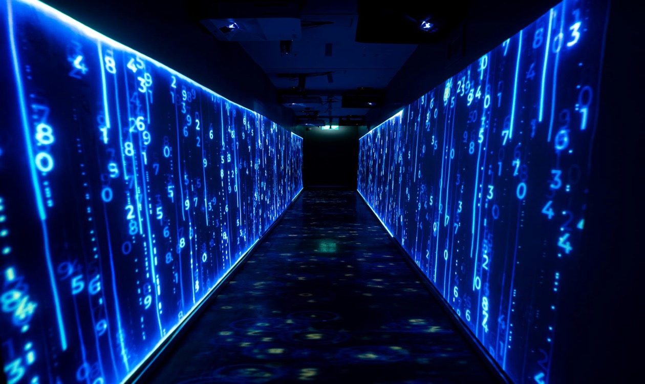 Futuristic blue digital data tunnel representing automated commerce protocols and AI agent data flow